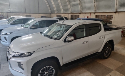Purchase of four-wheel drive pickup trucks